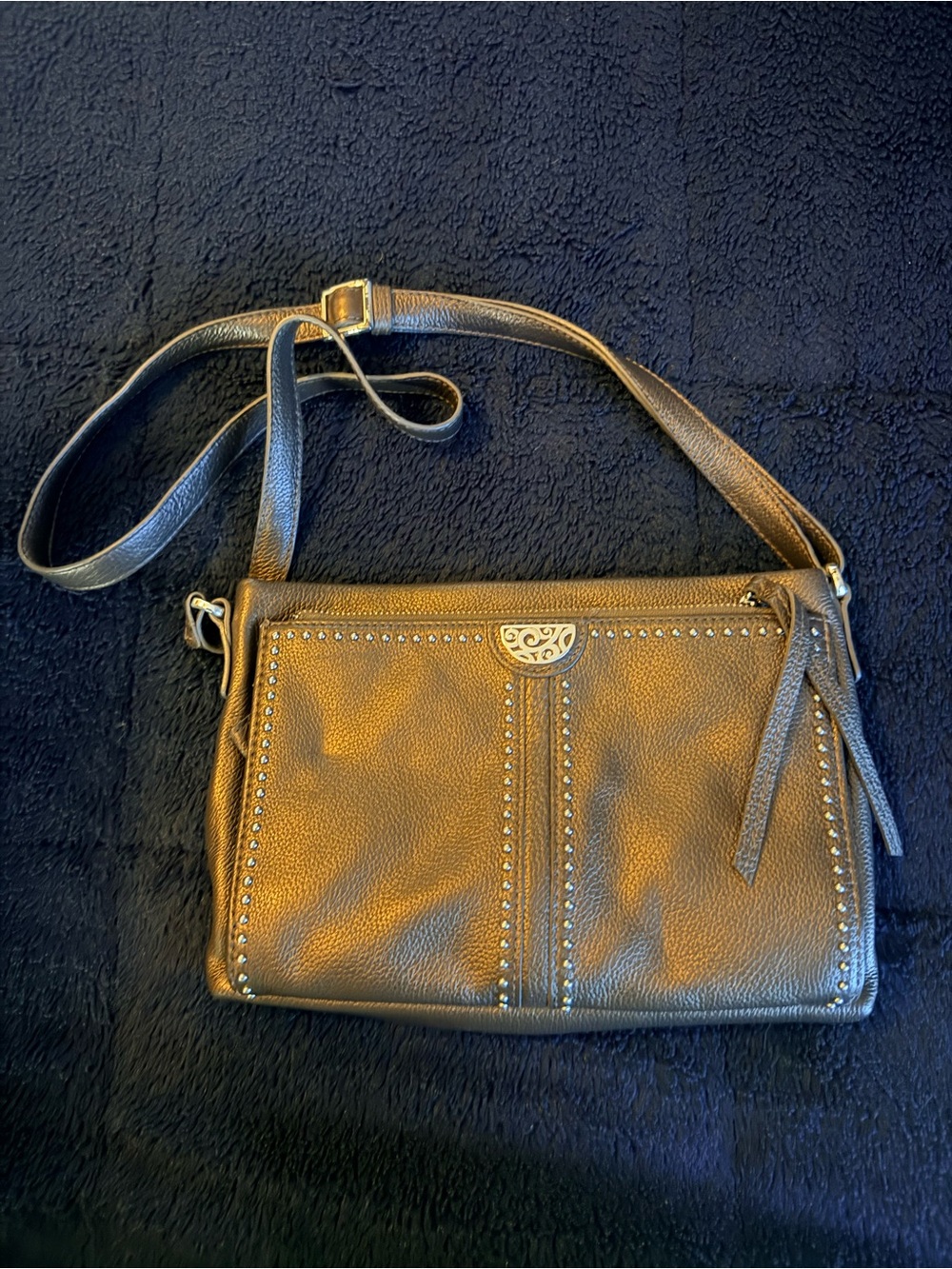 Brighton Stud-Trim Saddle Crossbody Bag in Metallic Bronze with dust bag